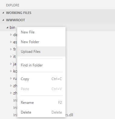 App Service Editor file explorer with the bin folder's right-click context menu open and Upload Files highlighted